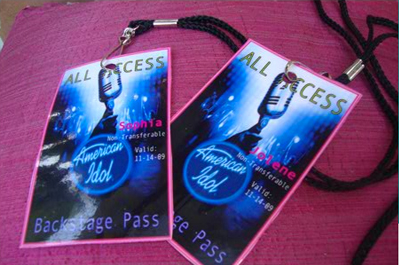 Two "all access" backstage passes for american idol, featuring a microphone and guitar on a cosmic background, personalized for sophia and kylene.